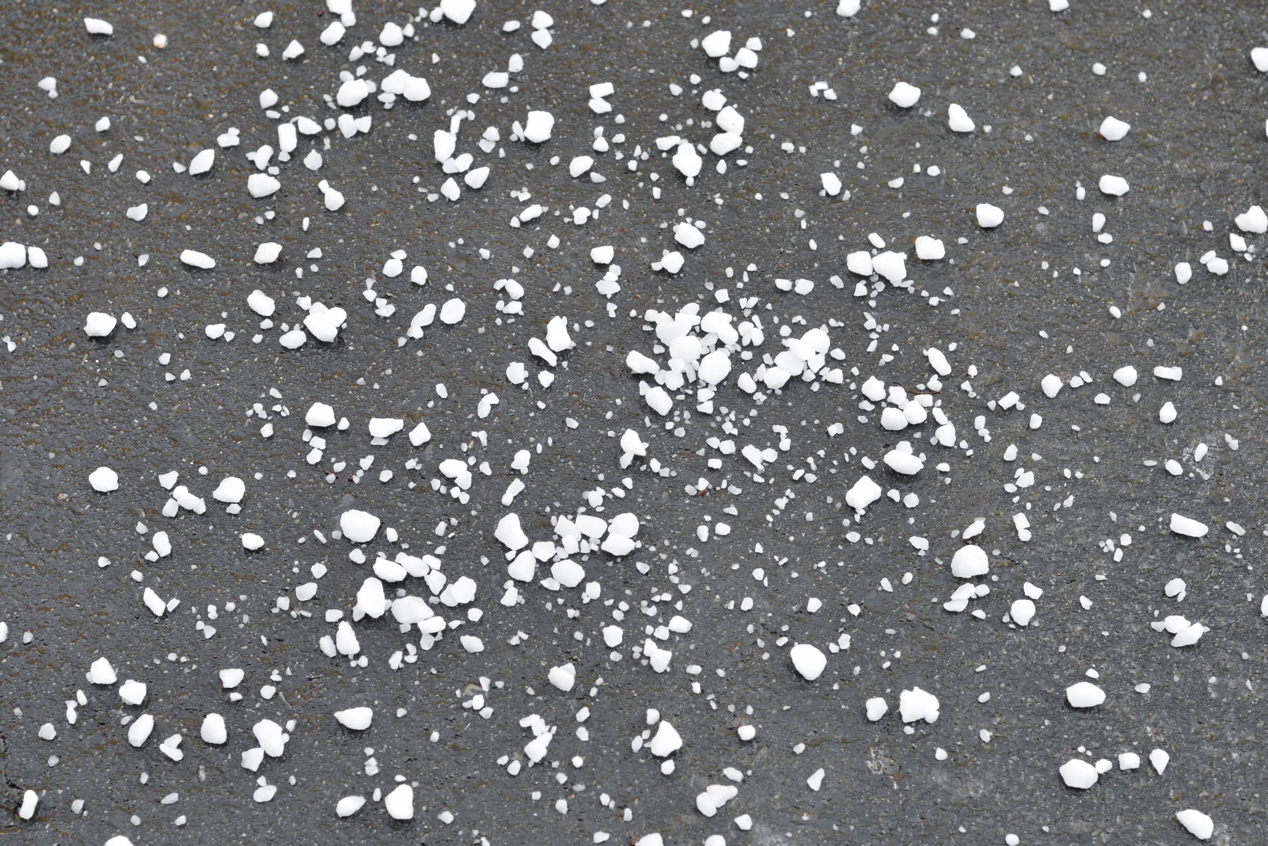 Rock salt on driveway.