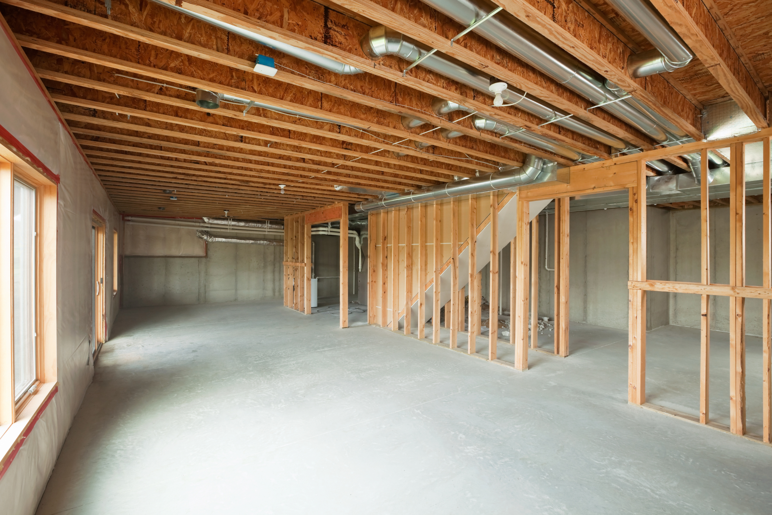 Empty basement unfinished.