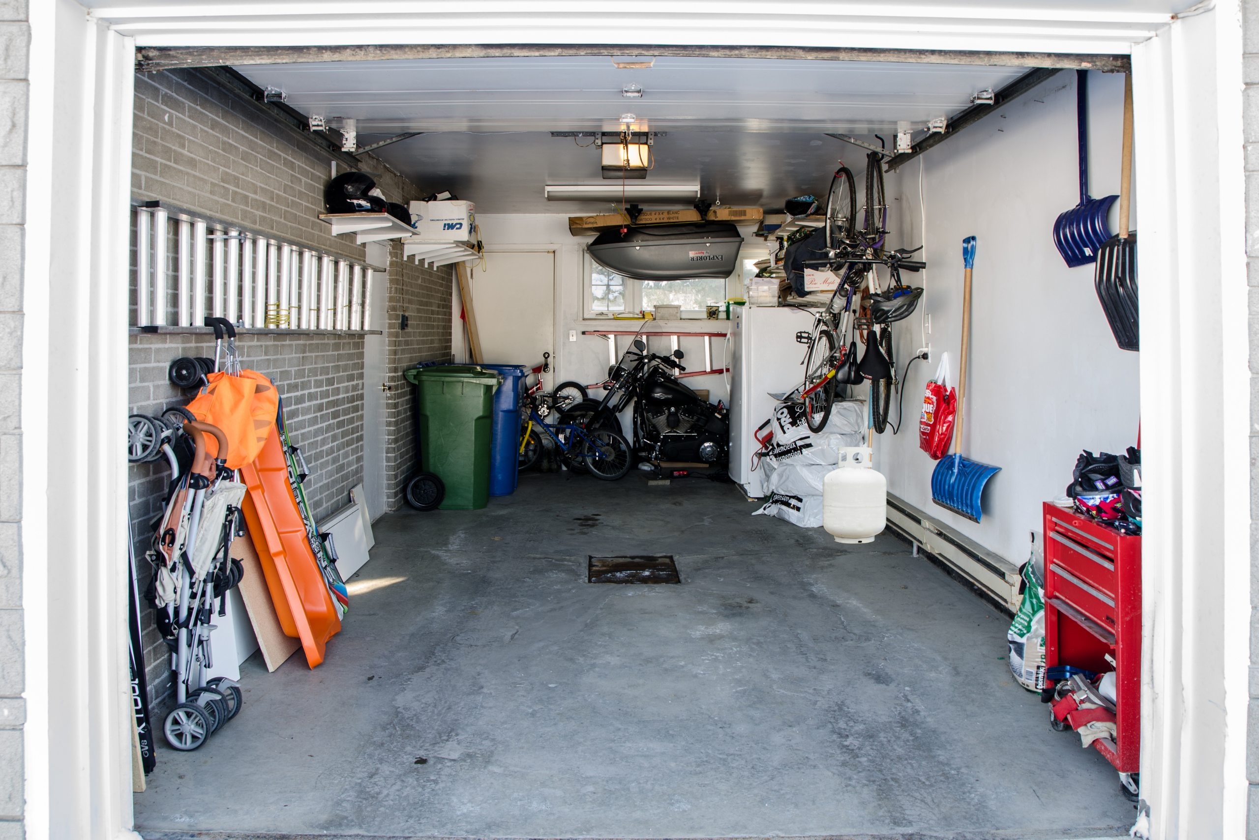 Garage with propane tank.