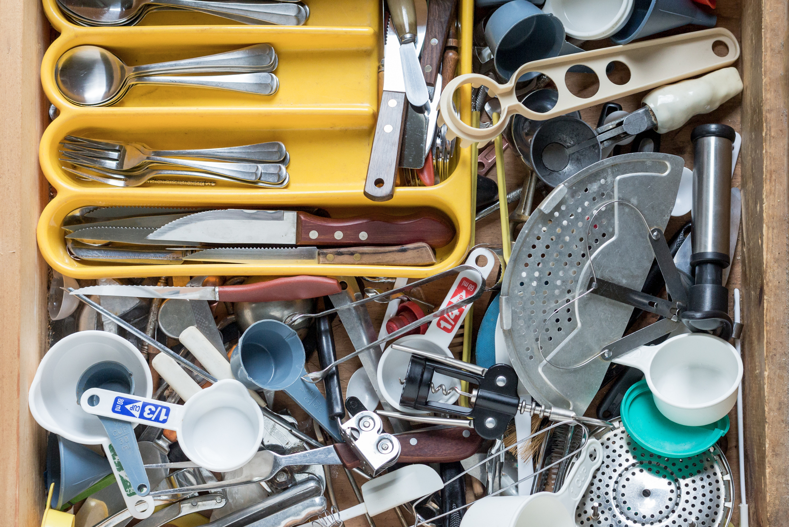 Drawer full of kitchen utensils. 