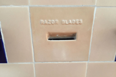 Razor blade slot in wall.