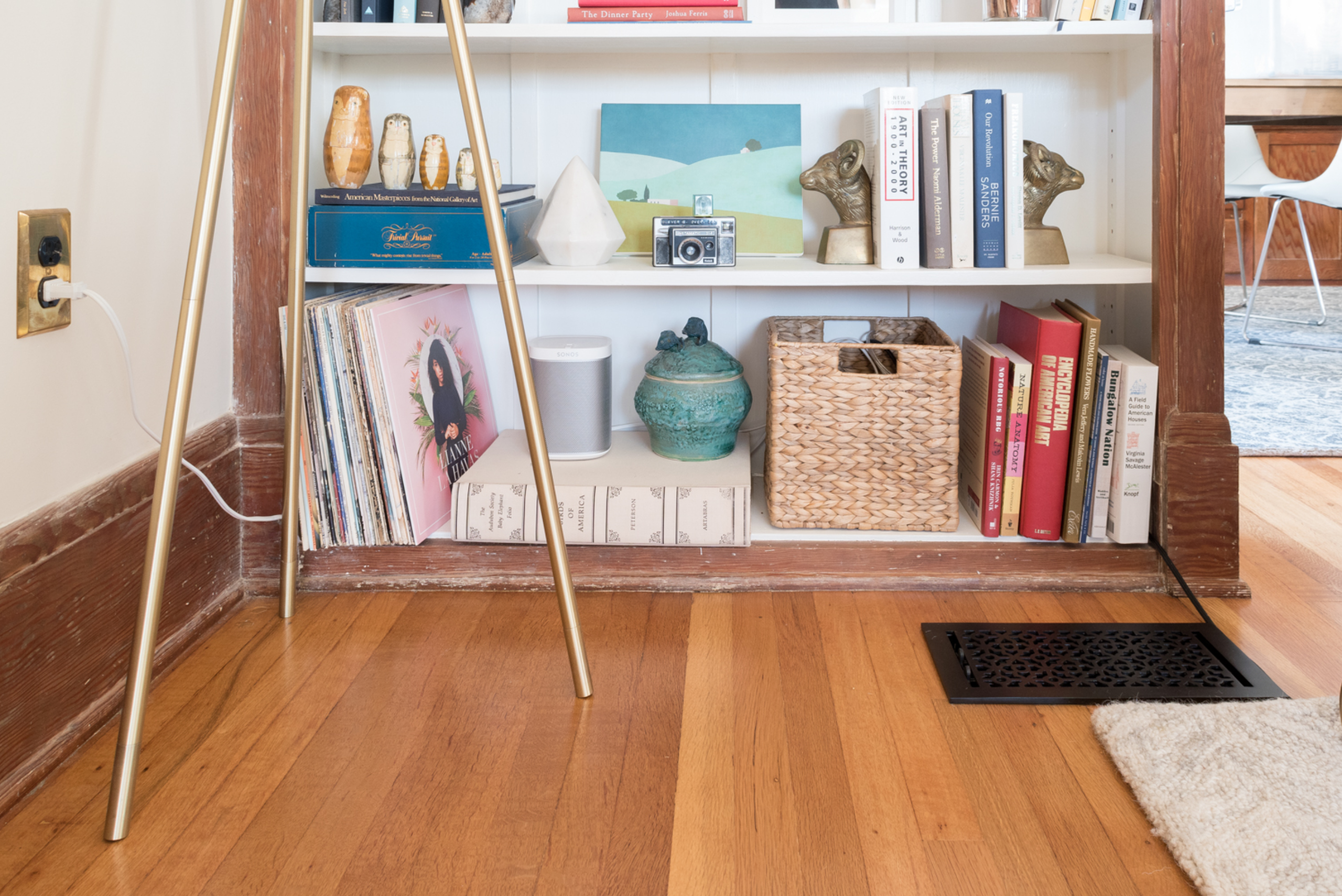 Cord running behind furniture.