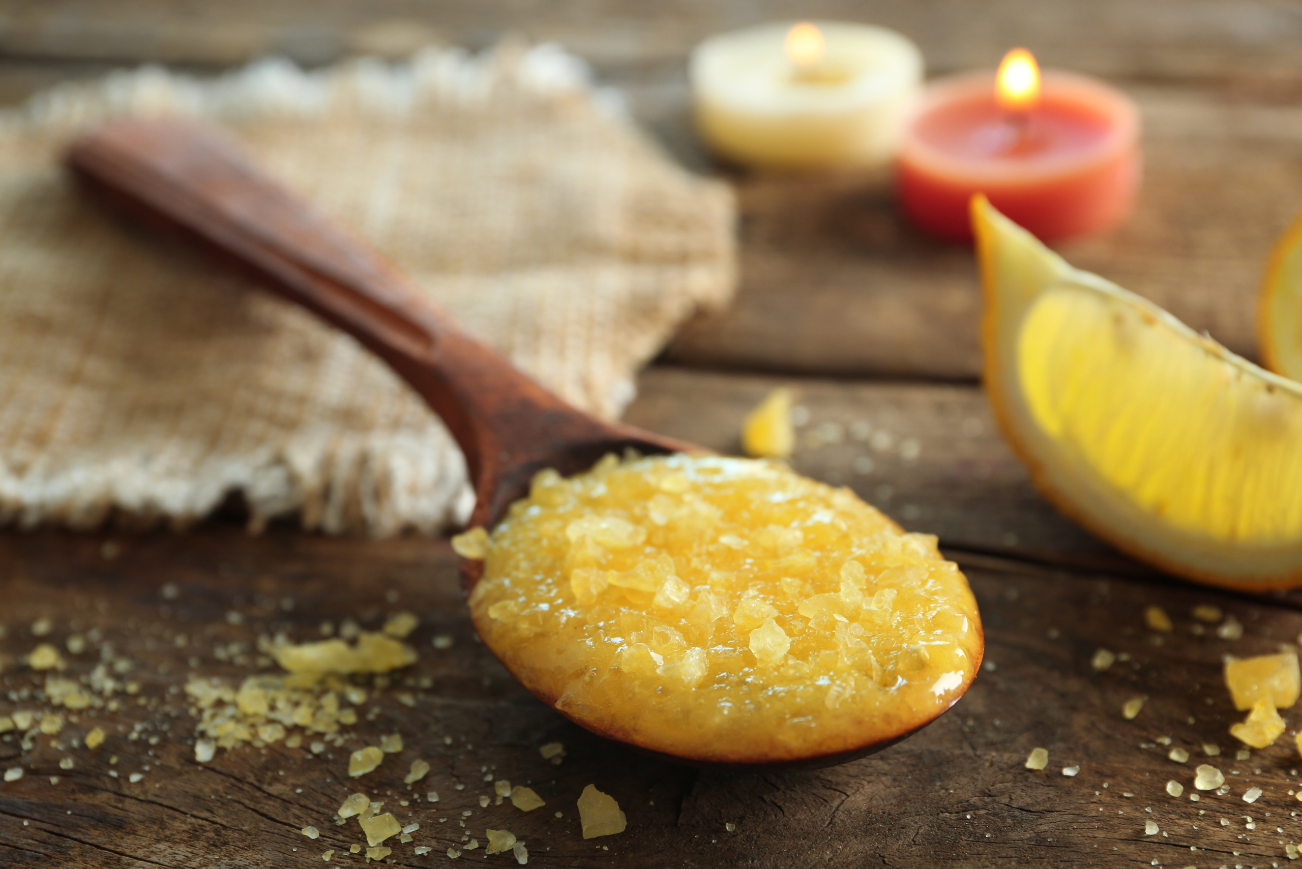 Lemon paste on wooden spoon.